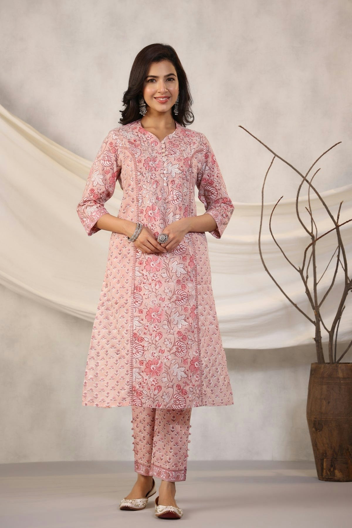 Woman in a pink floral kurta