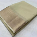 Vaystra Crepe Chit Pallu Solid Saree With Unstitched Blouse 5.5Mtr – Beige
